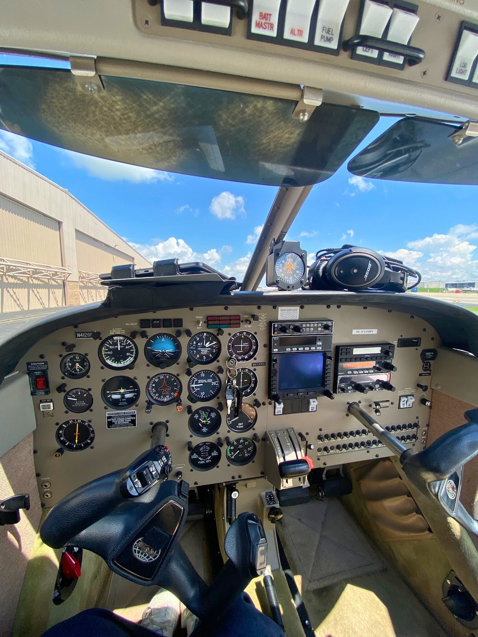 Cockpit instrument panel of a D&J Aviation training aircraft on the ramp