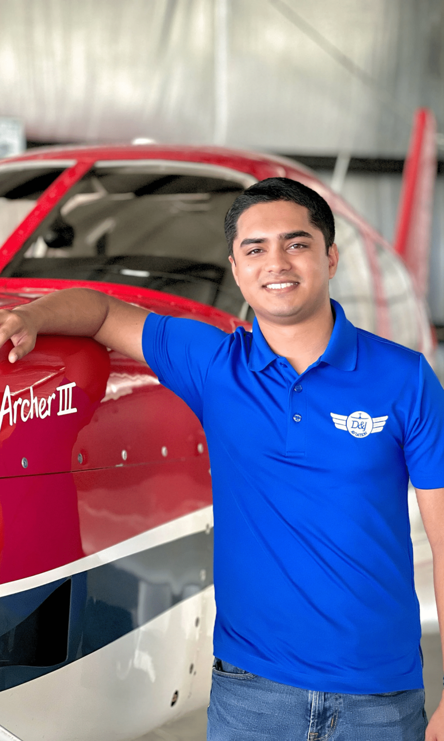 Man standing next to an Archer Airplane